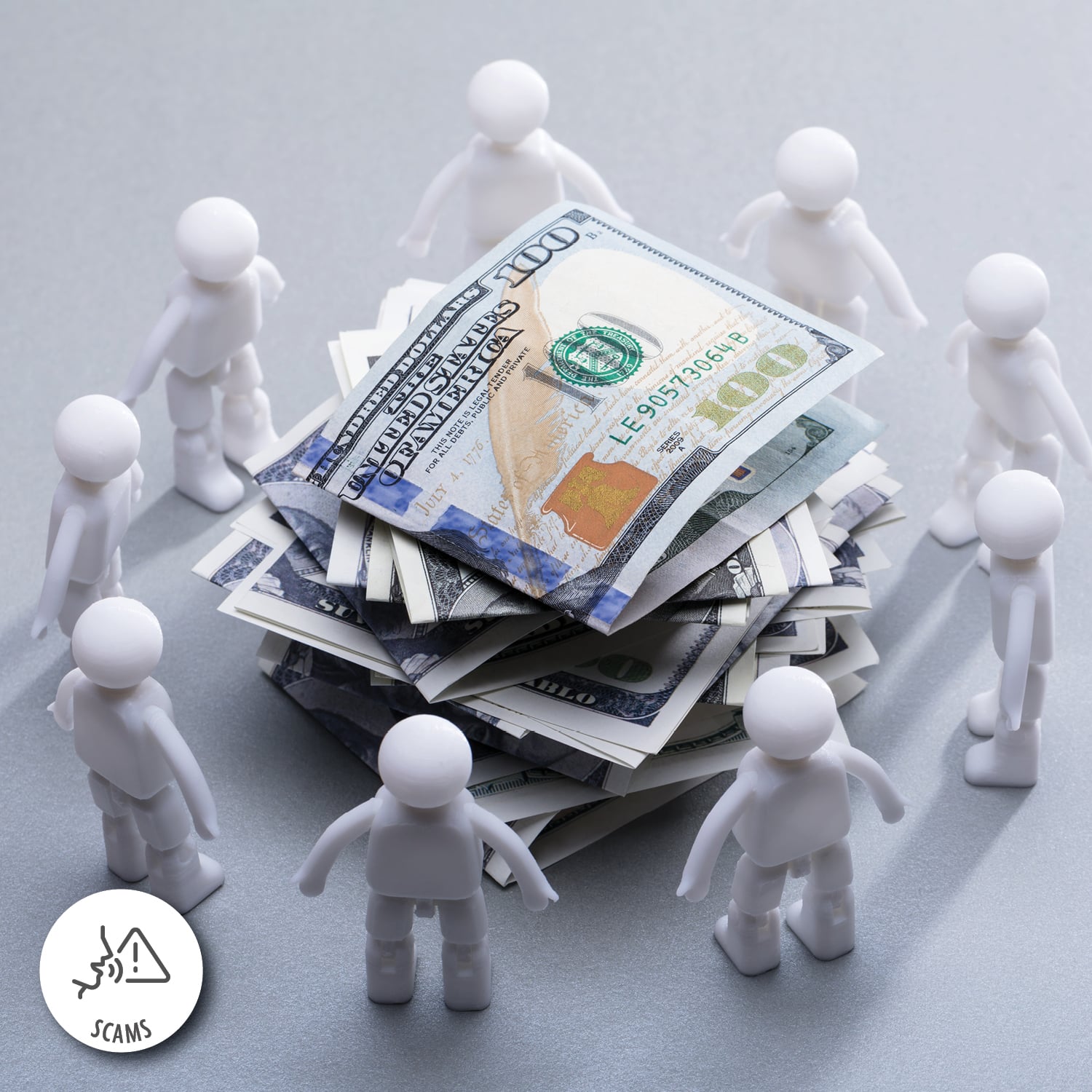 Nine small plastic action figures standing in a circle around a stack of hundred dollar bills.